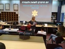 Image may contain: 2 people, people sitting and screen